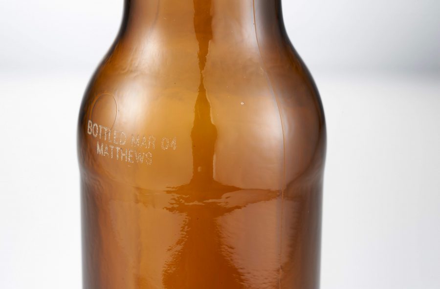 Laser mark on amber glass bottle 